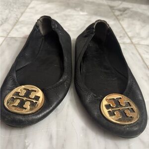 Tory Burch Black Flats with Gold Emblem